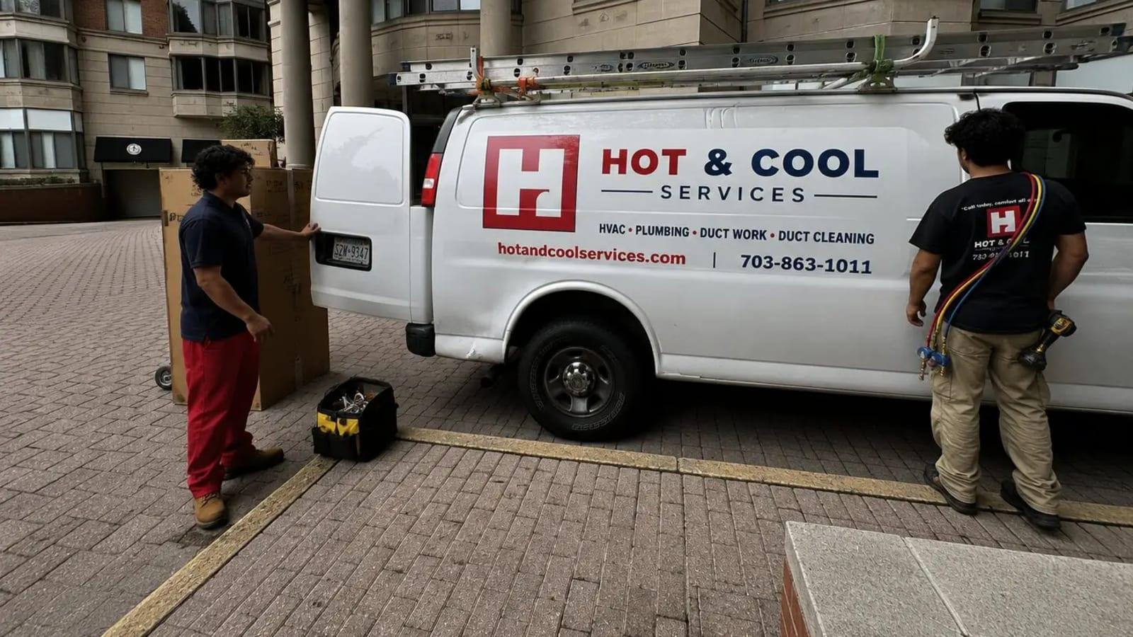 Hot & Cool Services technicians arriving for an HVAC service visit
